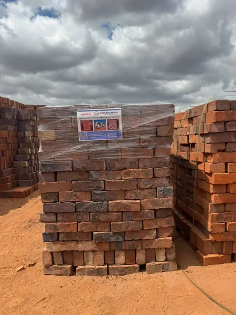 Bricks and building sand delivered to the same site in one load