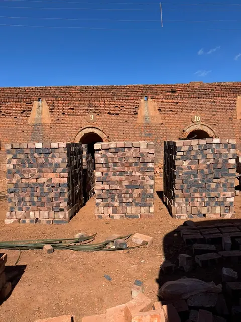 Brick delivery truck loaded and strapped down before a run to a Harare building site